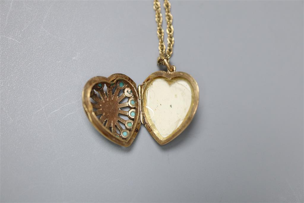A modern pierced 9ct gold and turquoise set heart shaped locket, on a 9ct chain, gross 8.5 grams & a brooch & pr of earrings.